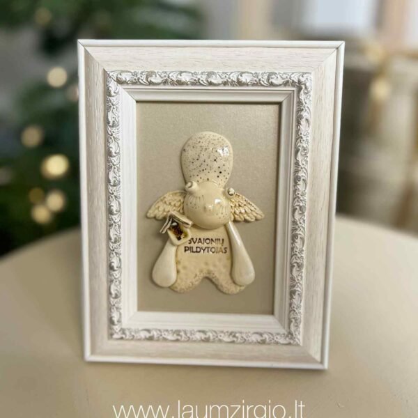 Keraminis angelas rėmelyje