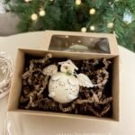 Keraminis angelas dėžutėje