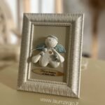 Keraminis angelas rėmelyje